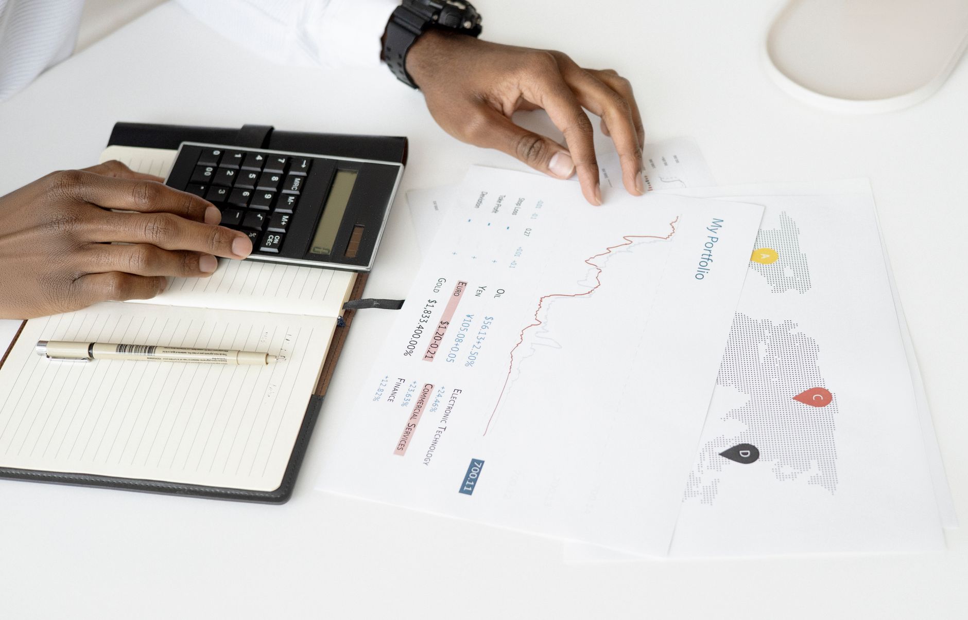 Financial partners examining data reports